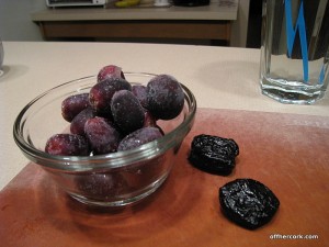 Frozen grapes and two prunes