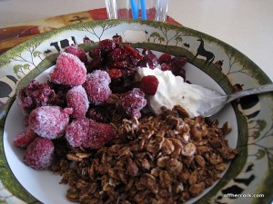 Yogurt, granola and frozen fruit 