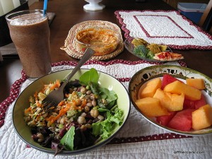Salad, smoothie, crackers, and fruit 