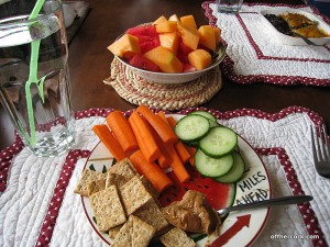 Crackers, carrots, cucumbers, and fruit 