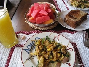 Eggs, juice, and fruit 