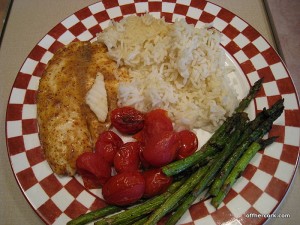 Fish, asparagus, tomatoes, and rice 