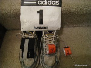 Running shoes and race bib 