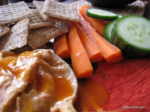 crackers, carrots, cucumbers, and hummus 