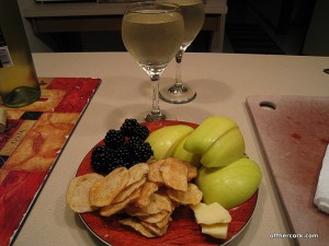Fruit, chips, wine
