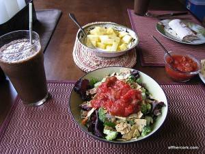 Salad, smoothie, and fruit 