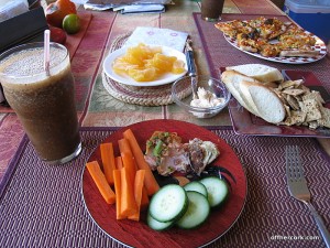 Smoothie, veggies, crackers, and fruit 