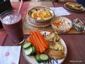 Smoothie, veggies, fish, crackers, and fruit 