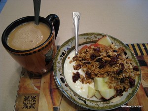 Coffee and yogurt and granola 