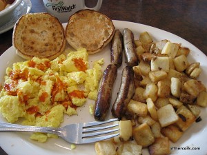 Eggs, sausage, potatoes, and english muffin 