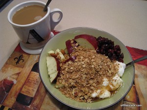 mug, yogurt and fruit with granola 