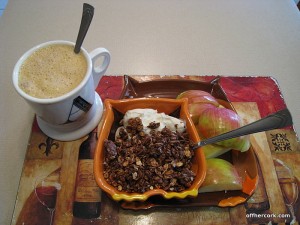 Coffee, fruit, yogurt, and granola 