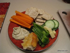 veggies, hummus, crackers, cheese, bread 