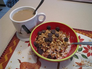 Coffee and yogurt with granola.