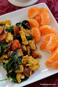 Scramble with tomatoes, spinach, and potatoes. Mandarin oranges