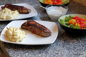 Steaks, mashed potatoes, side salad