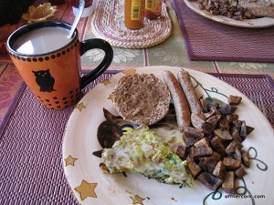 coffee, fritatta, muffin, sausage, and potatoes 